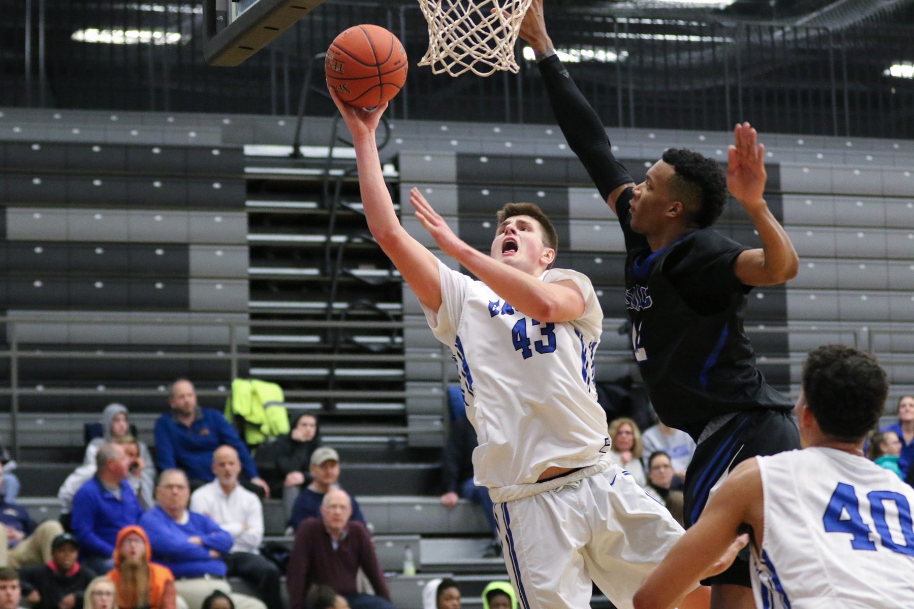 Kirkwood forward Luke Appel makes a strong move to the basket during Thursday night's victory over DMACC in the regional semi-final at Johnson Hall. (photo by Jeff Yoder)