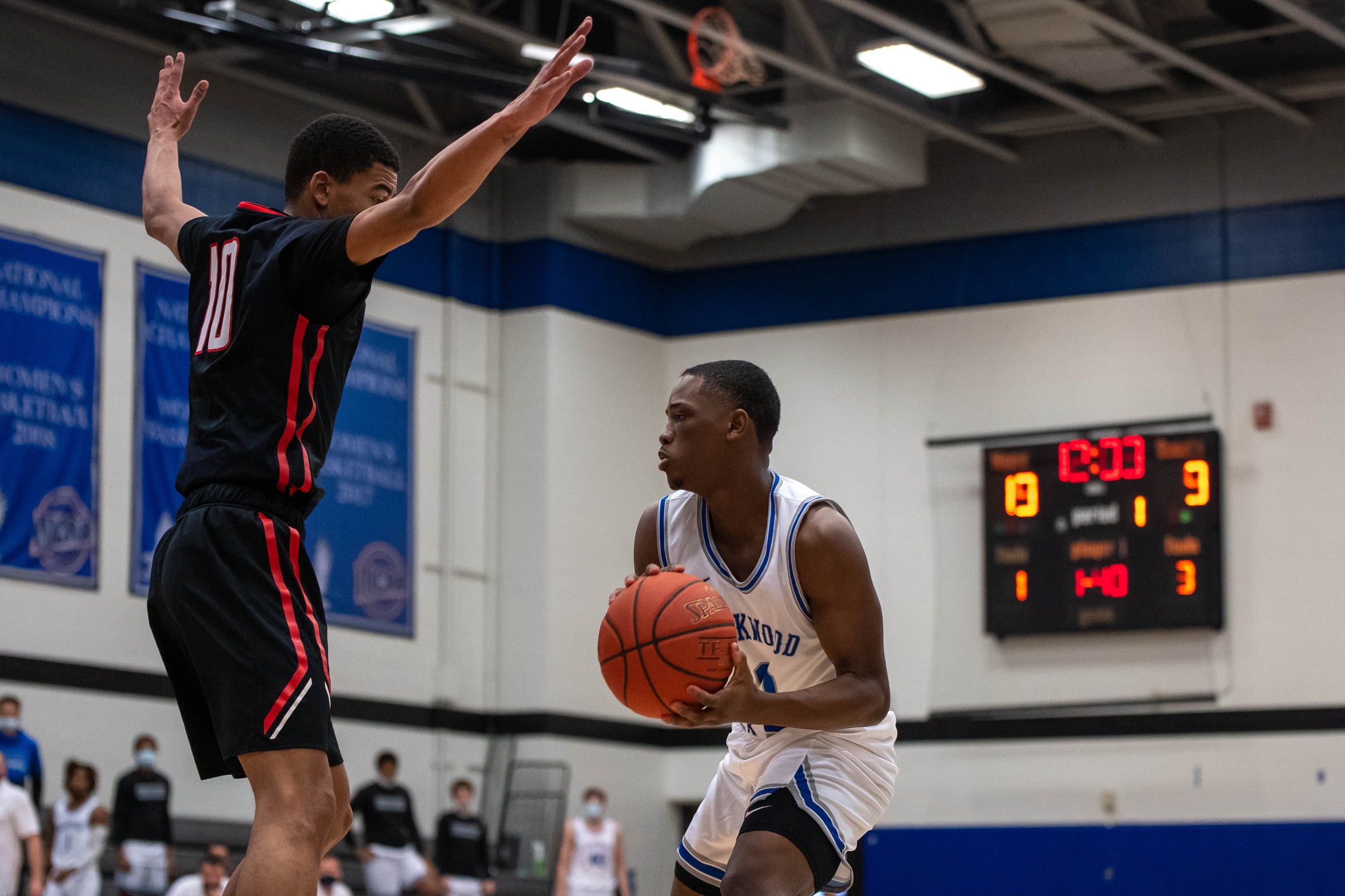Walker sparks KCC men past Tritons